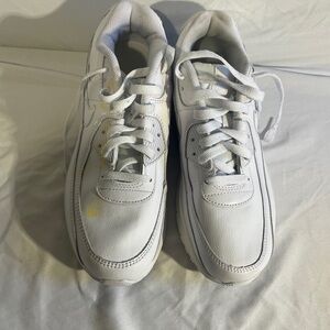 Nike Air Max 90 sneakers, commonly styled as the "Triple White" version.